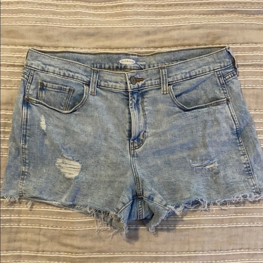 Acid wash distressed boyfriend cutoffs